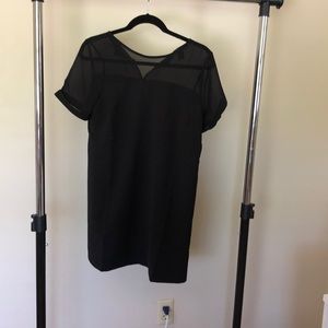Black dress with mesh neck. Never been worn.